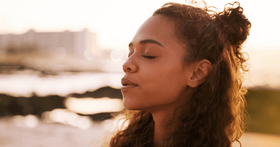 Woman doing meditative breathing